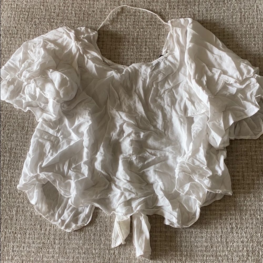 White flowy top